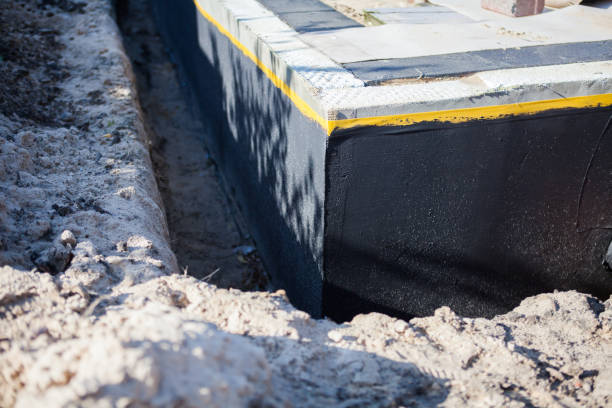 Professional Waterproofing technician working in Oregon, OH